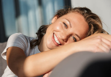 a smiling young woman