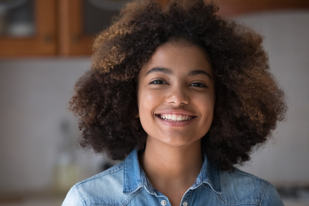 A young african american woman smiling